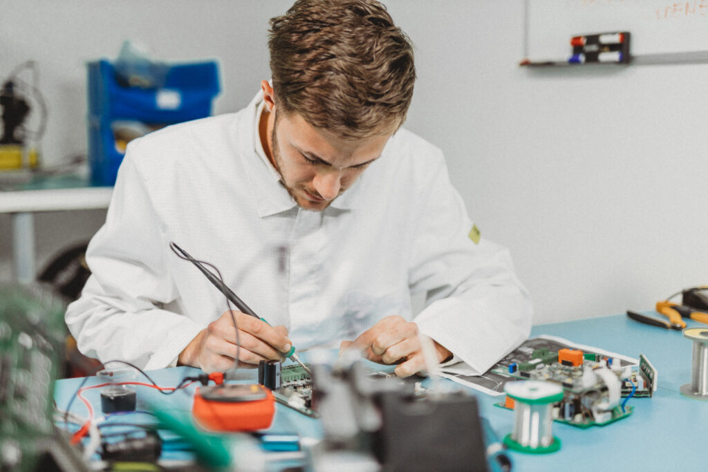 photo of a person during soldering